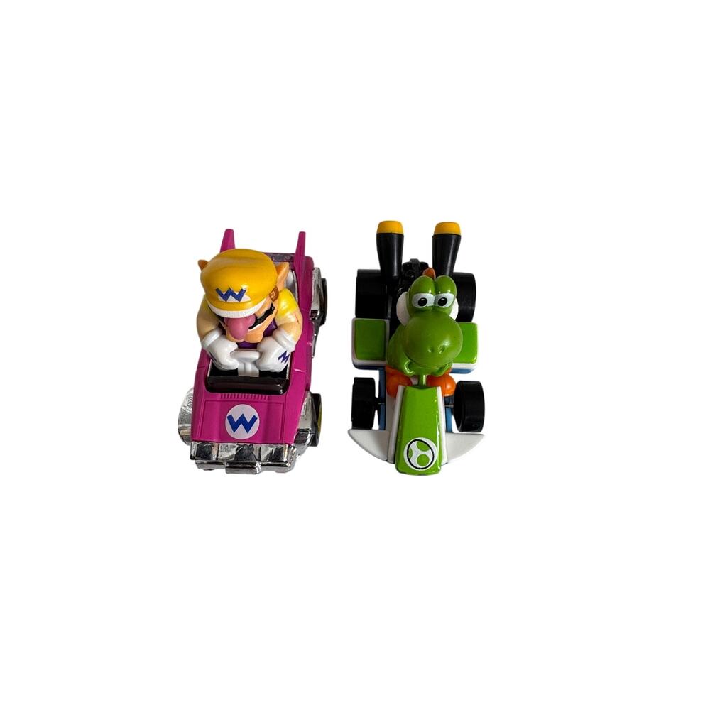 two Hot Wheels Mario Kart die-cast toy cars Wario Bandwagon green Yoshi kart